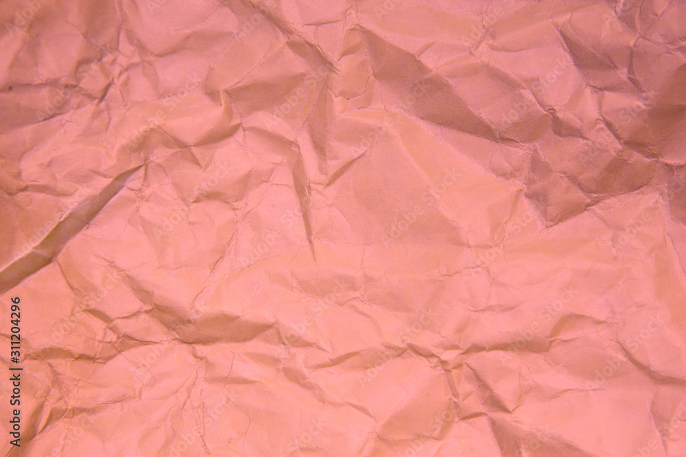 Fototapeta premium Crumpled pink paper.