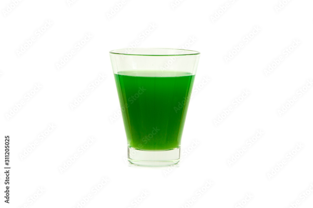Green cocktail in a glass for martini with ice isolated on a white background. Green cocktail with martini on a white background. Green cocktail in a glass for martini with ice isolated on a white background. Green cocktail with martini on a white background.