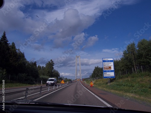 Country Road, cloudy sommar fourney in Sweden photo