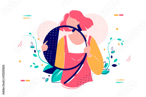 Woman holding number nine