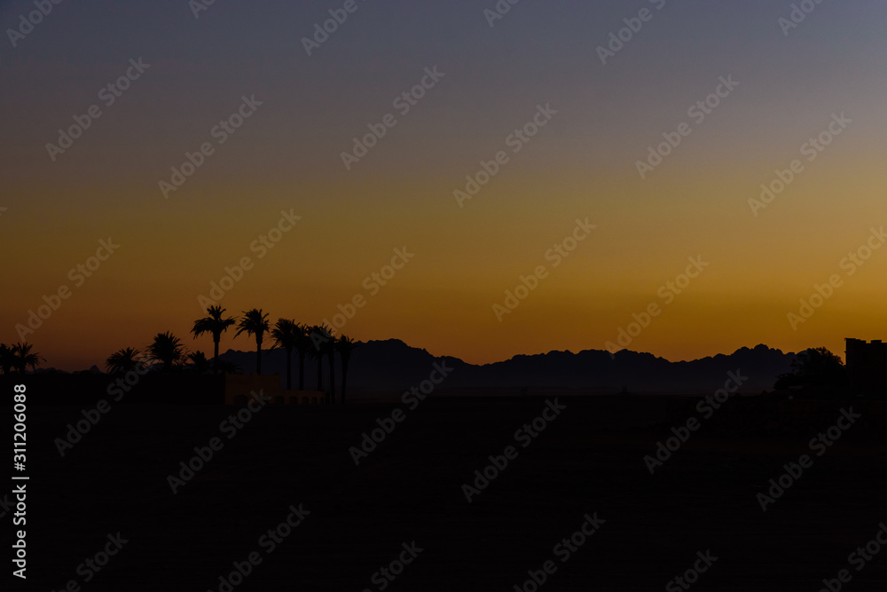 Sunset in arabian desert not far from the Hurghada city, Egypt