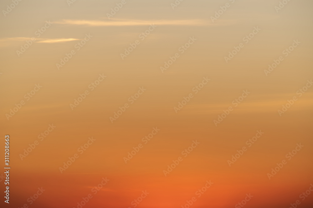Fototapeta premium Sky gradient from blue to orange sunset