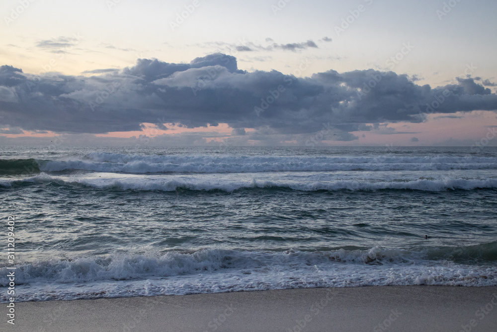 Fototapeta premium Sunset waves at Marina State Beach in Monterey County California 
