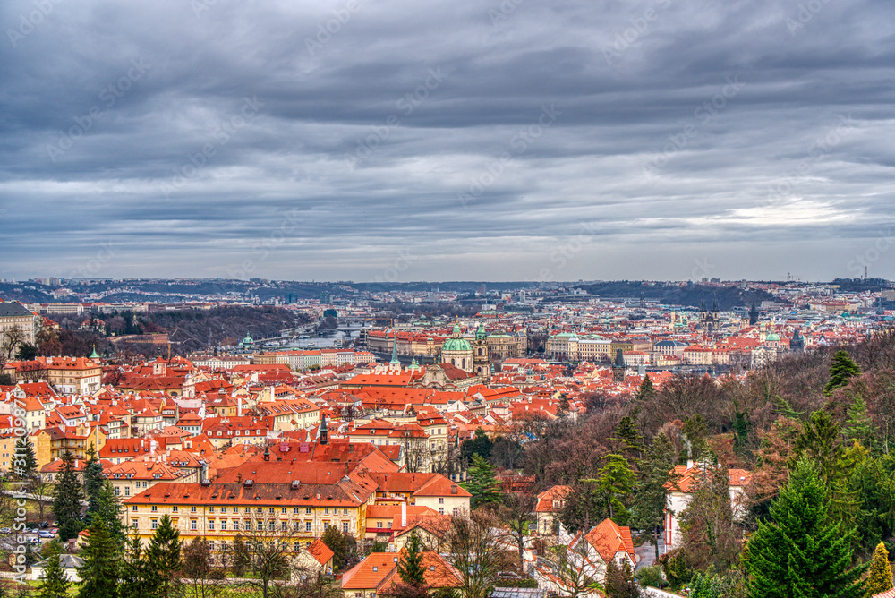 She was old in Prague with a beautiful cloudy sky