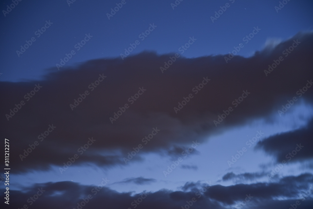 Naklejka premium Night Blue Cloudy Sky