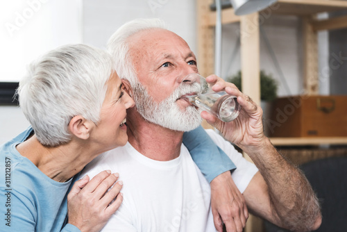 Senior couple drink water