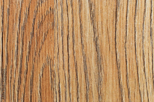 Wooden light textured background in brown color. View from above
