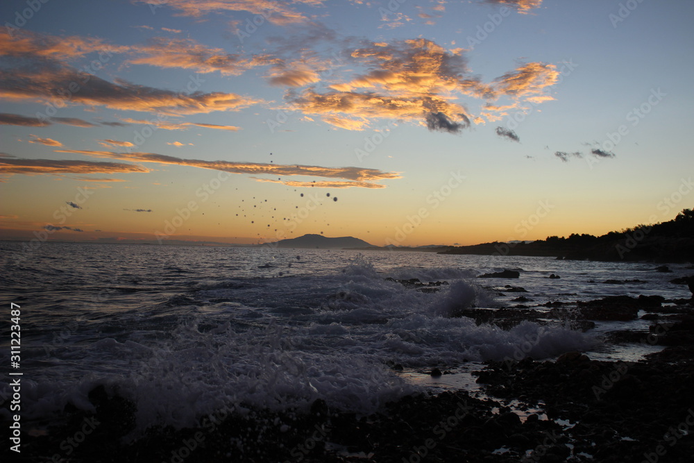 Sunset sea rough