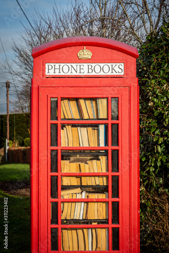 An old phone box repurposed as a library photo