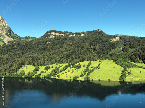 Chli Mutzenstein mountain above the Wagital valley (Waegital or Wägital) and alpine Lake Wagitalersee (Wägitalersee), Innerthal - Canton of Schwyz, Switzerland photo