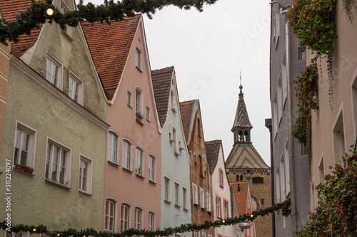 Schmalzturm in Landsberg am Lech mit bunten Häusern und Weihnachtsgirlanden photo