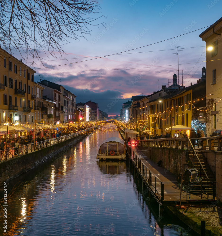 the ancient Navigli district illuminated for the Christmas holidays at sunset. Milan - Italy