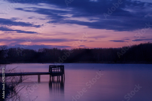 pier at sunset on the lake