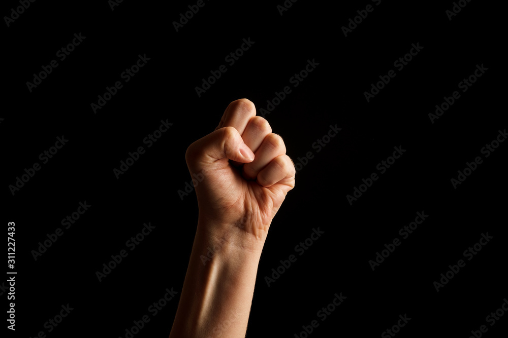 Hand Showing Sign of S Alphabet in American Sign Language (ASL), isolated on black background. Sign language Hand Showing Sign of S Alphabet in American Sign Language (ASL), isolated on black background. Sign language