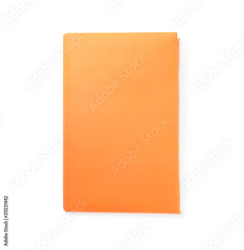 Book with blank orange cover isolated on white, top view