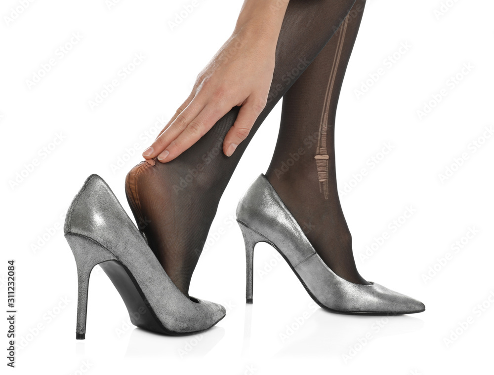 Woman wearing torn tights on white background, closeup Woman wearing torn tights on white background, closeup