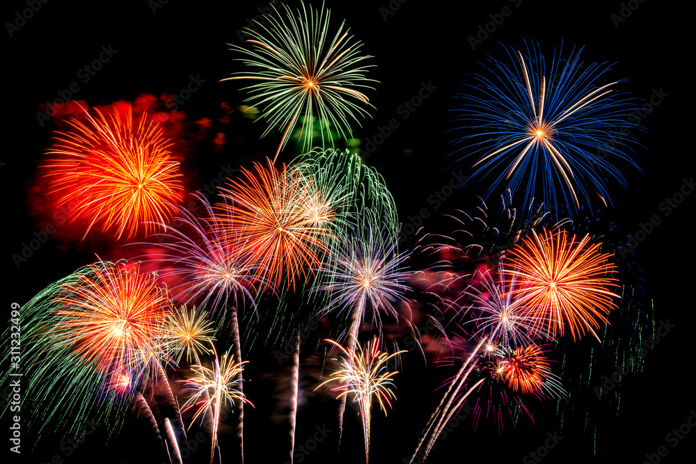 Abstract fireworks on black sky background for Celebration, anniversary and happy new year