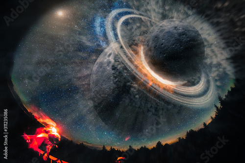 Fototapeta Naklejka Na Ścianę i Meble -  Landscape from the earth to the burning planets apocalipsis. Elements of this image furnished by NASA.