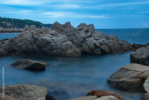 Barcelona, Spain - 18.08.2019: Beautiful cliffs on the Spanish coast of the Mediterranean Sea © Valentin