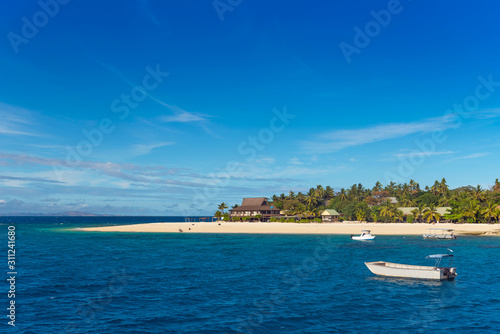 Boats on the island, Fiji. Copy space for text. © ggfoto
