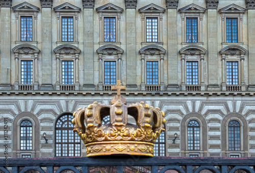 Tsar’s crown, a monument on the background of an old building