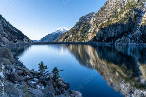 Cavallers reservoir in National Park of Aig  estortes and lake of Sant Maurici.
