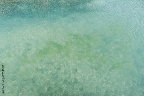 Blue water abstract background from the swimming pool