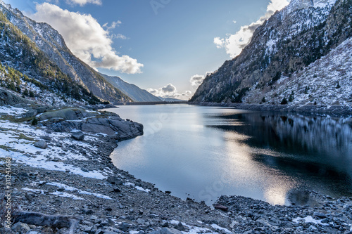 Cavallers reservoir in National Park of Aigüestortes and lake of Sant Maurici.