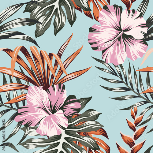 Tropical floral pink hibiscus flower orange palm leaves seamless pattern blue background. Exotic jungle wallpaper.