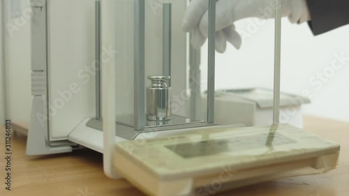 metrology calibration system weights and measures balance slow motion