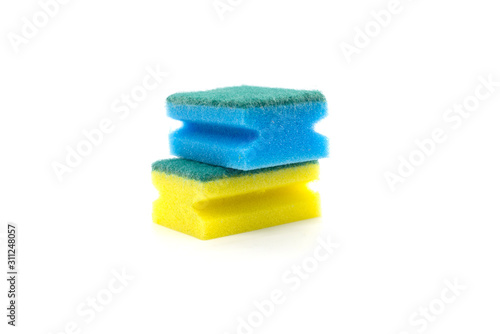 Two multi-colored sponges for washing dishes on a white background