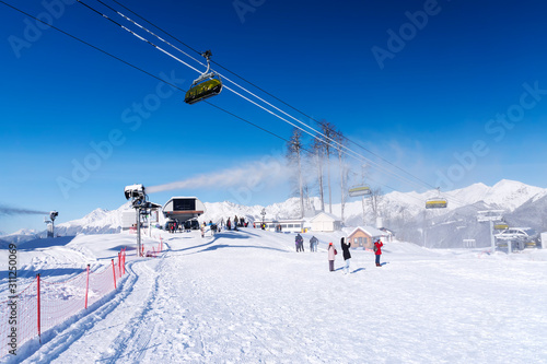 snow mountain glade with ski lifts
