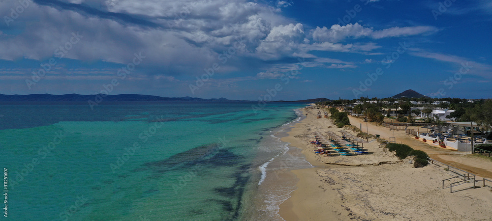 Aerial drone photo of beautiful and popular beach of Agia Anna in Naxos island, Cyclades, Greece