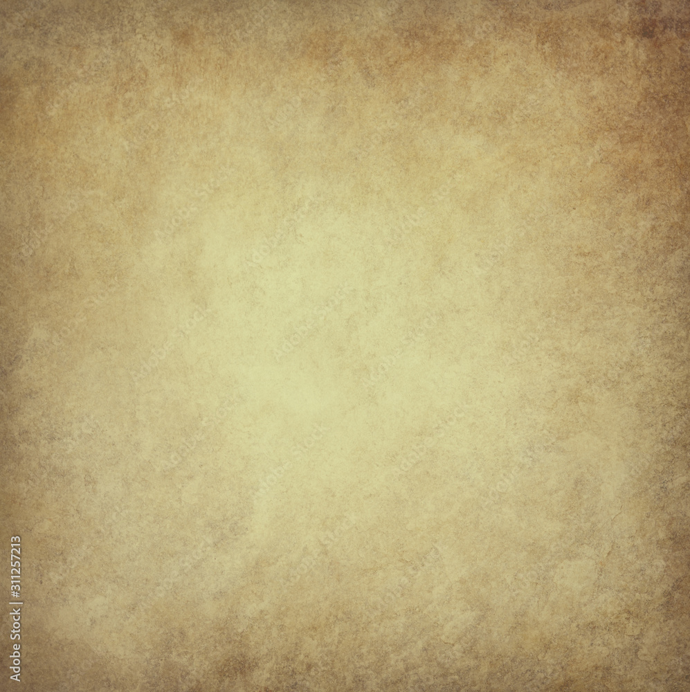 old brown parchment paper background with yellowed vintage grunge