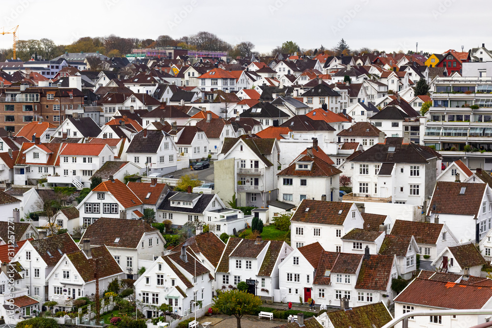 Thousands of white houses with red rooftops are the historic district in Stavanger called Gamle Stavanger (Old Stavanger), Norway