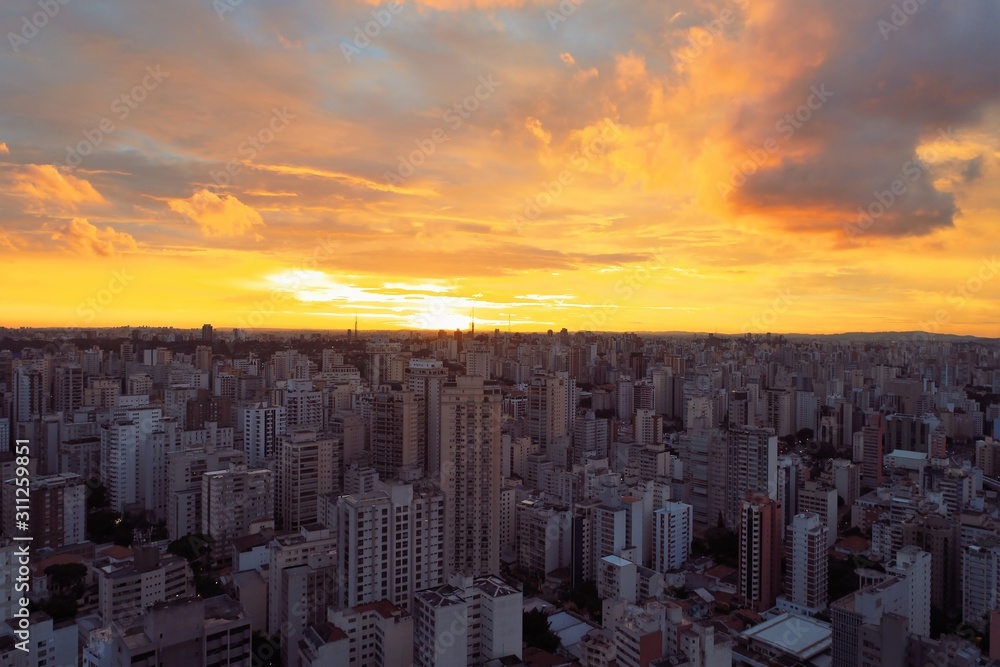Aerial view of sunset in São Paulo city, Brazil. Great sunset scene. Fantastic landscape. 