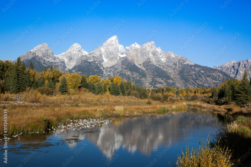 Old Grand Teton reflected in the Snake River