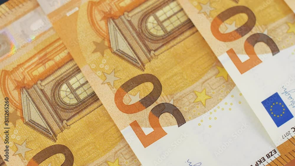 Close up of 50 euro money notes. Background with money euro bills. Cash money background. 4k footage. Close up of 50 euro money notes. Background with money euro bills. Cash money background. 4k footage.