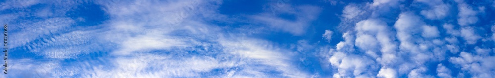 Panorama blue sky background with tiny clouds Panorama blue sky background with tiny clouds
