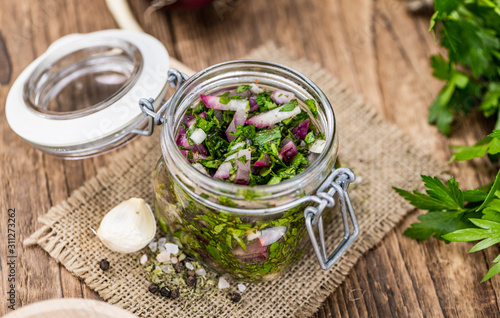 Chimichurri (fresh) as detailed close-up shot, selective focus)