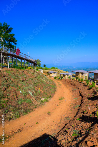 Fényképezés Wooden bridge with scenic view at Doi Sa Ngo viewpoint