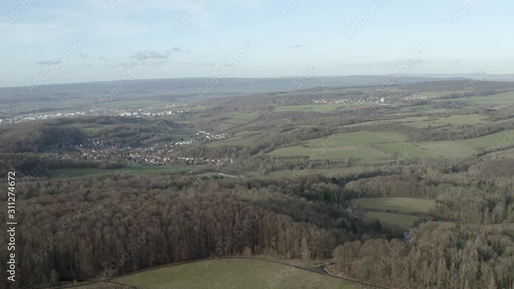 Sheep running in one direction in Beautiful german nature, captured by a drone in 4k. Rural countryside landscape along quite and peaceful walking trails. Sheep running in one direction in Beautiful german nature, captured by a drone in 4k. Rural countryside landscape along quite and peaceful walking trails.
