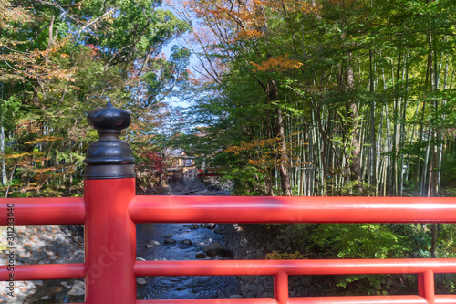 Red bridge named Kaede bridge at Shuzenji hot spring Shizuoka Japan.