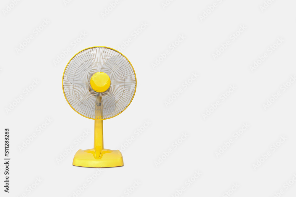Electric Yellow table fan isolated on white background - obrazy, fototapety, plakaty 