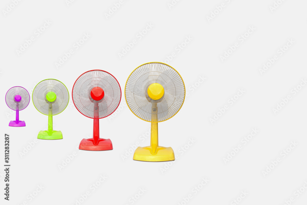 Electric colorful table fan isolated on white background.Front view Electric colorful table fan isolated on white background.Front view