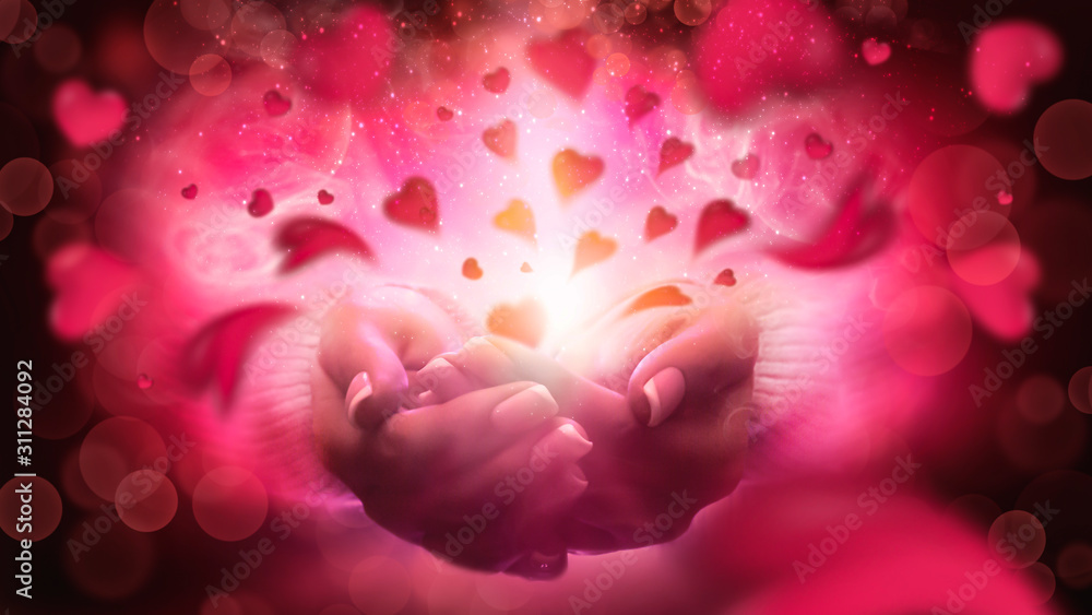 Heart in the hands. Magic particles emanating from female hands. Magic particles on the palms, magic, witchcraft. Give love. Heart in the hands. Magic particles emanating from female hands. Magic particles on the palms, magic, witchcraft. Give love.