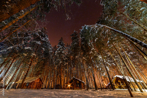 Hutrural  fir  frost  cottage  season  snowy  celebration  pine  snowfall  north  xmas  roof  chalet  outdoors  travel  landscape  wooden  home  nature  house in the woods on a winter Christmas night.