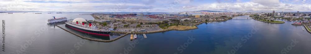 Queen Mary, Port of Long Beach and Long Beach downtown modern skyline panorama aerial view in harbor of Long Beach, Los Angeles County, California CA, USA.