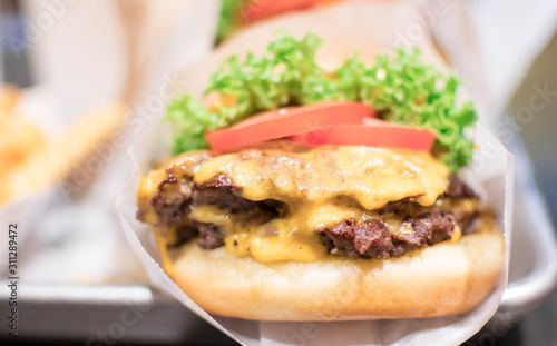 Shake shack burger yummy beef burger with melting cheese and vegetables