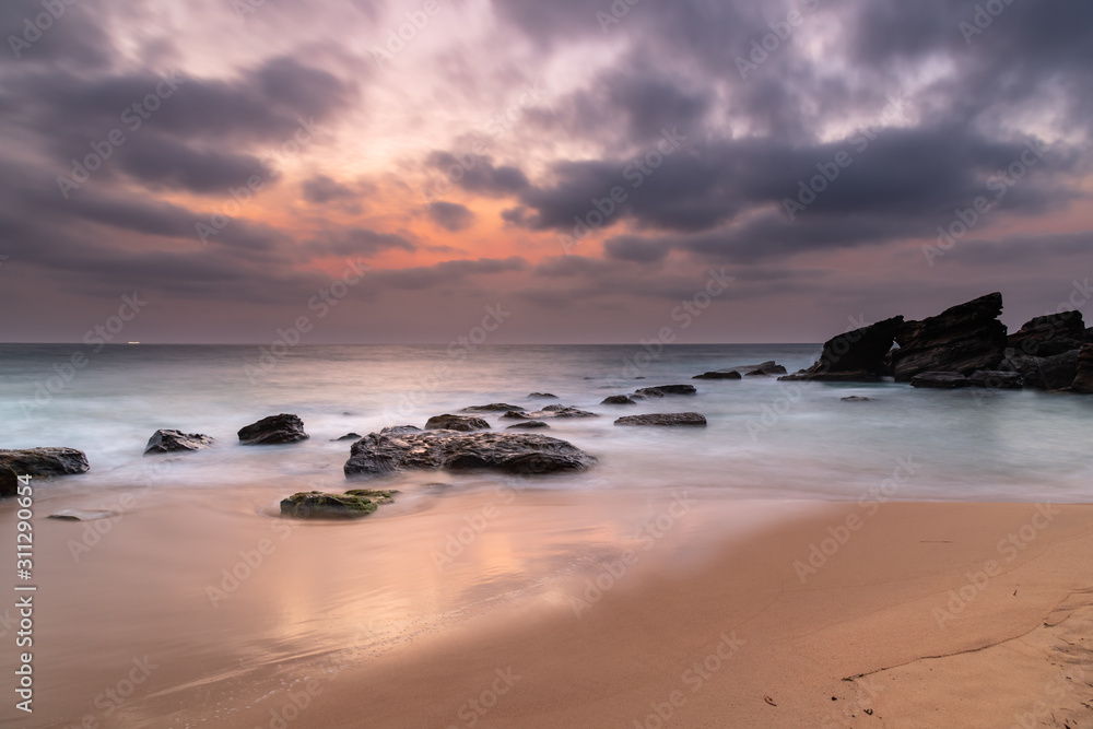 Fototapeta premium Soft Dawn Seascape with Smoky Haze and Clouds at the Seaside